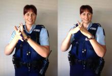 Constable Debi Leahy signing New Zealand Sign Language week.
