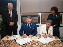 Police Commissioner Mike Bush and MPIA Chief Executive Pauline Winter sign the MoU