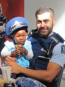 Constable Phil Pithyou gets to know 16-month-old Oyella-Varina Okee Young