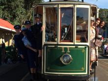 North: The torch goes by tram at MOTAT in Auckland.