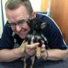 Eye ball to eye ball: the puppy investigates getting glasses