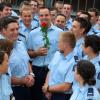 Roses are red; new cop to wed - Constable Gavin Smith is congratulated by fellow wing members.