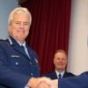 Commissioner Peter Marshall welcomes a new constable into the ranks.