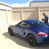 A Waikato TCU member verifies a recovered Porsche is one stolen in Hamilton
