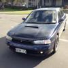 Blue Subaru Legacy, registration BHM733.