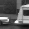 Photograph of silver Commodore ute with caravan