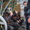 A Navy diver from the Royal New Zealand Navy Operational Dive Team gives the 'thumbs up' prior to diving from the HMNZS MANAWANU