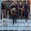 Navy divers from the Royal New Zealand Navy Operational Dive Team enter the water at the site of the sunken FV Jubilee