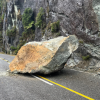 Picture of big rock in middle of road