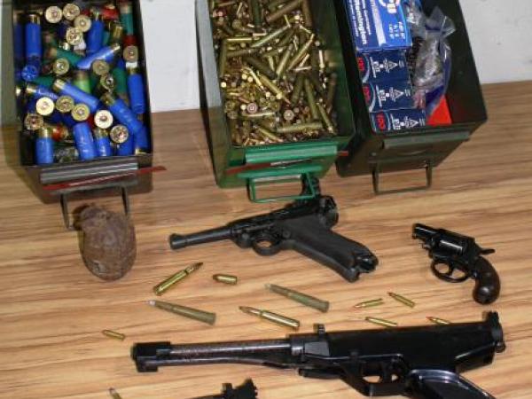 Some of the pistols, ammunition and a grenade surrendered to Waikato Police