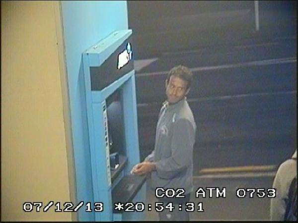 Cash out: Paul Arber accesses an ATM machine on Grey St
