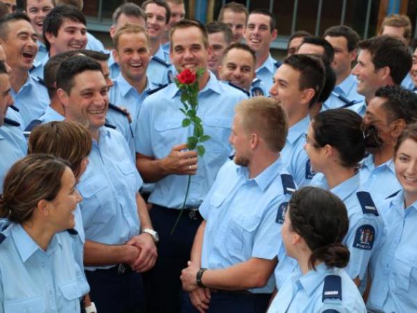 Roses are red; new cop to wed - Constable Gavin Smith is congratulated by fellow wing members.