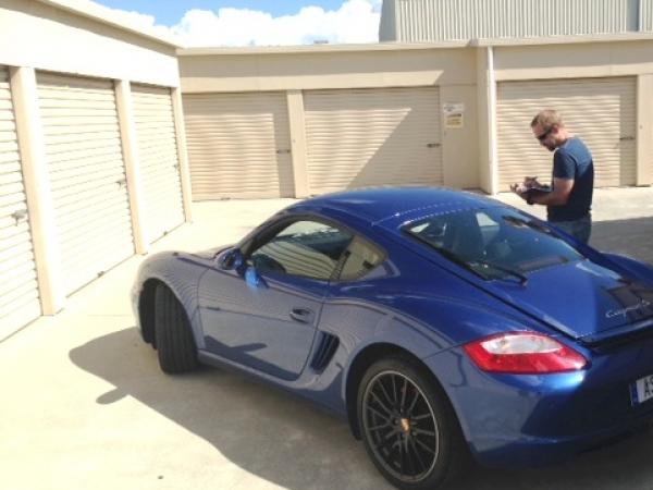 A Waikato TCU member verifies a recovered Porsche is one stolen in Hamilton