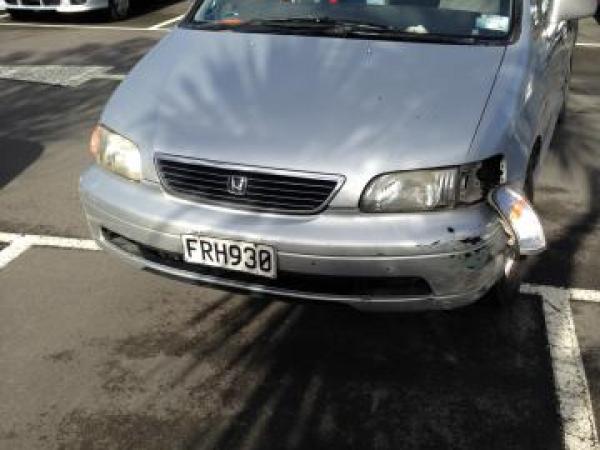 Silver Honda Odyssey station wagon, registration FRH930.