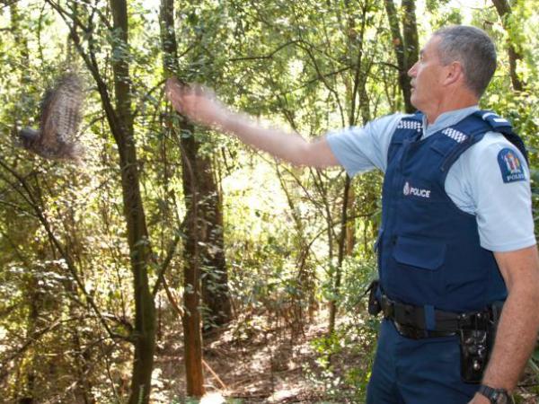 Be Free: Senior Constable Richard Collier sets the bird free