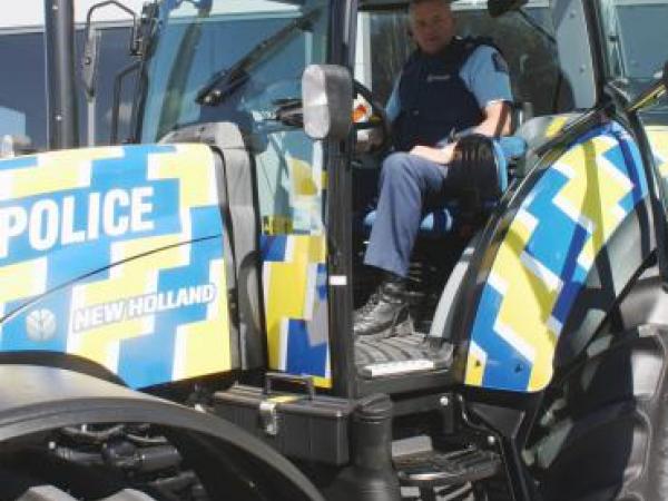 Rural beat: Cambridge Sergeant Gordon Grantham gets to grips with the new tractor