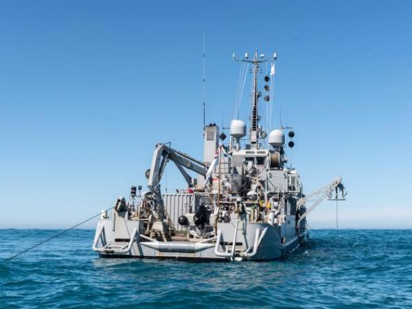 The Royal New Zealand Navy’s diving support vessel HMNZS MANAWANUI at the site of the sunken FV Jubilee