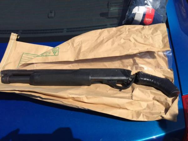 A shotgun recovered by Police during the investigation