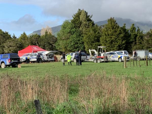 Police searching a property in Parakao today