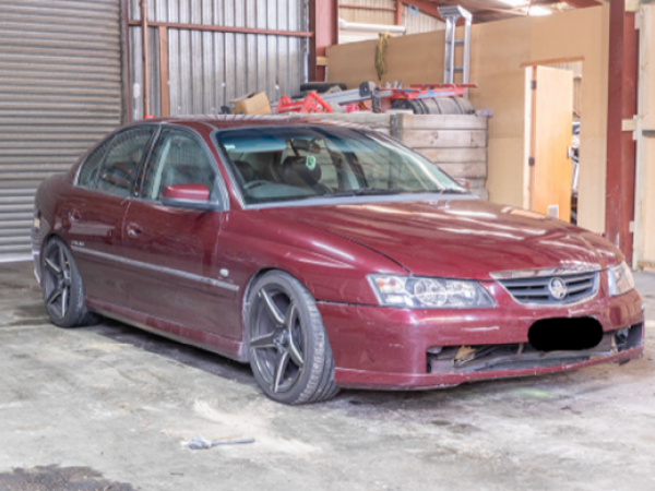 Maroon Holden Commodore