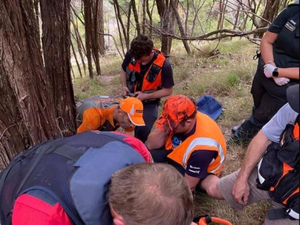 St John staff assessed the hunter down the slope.