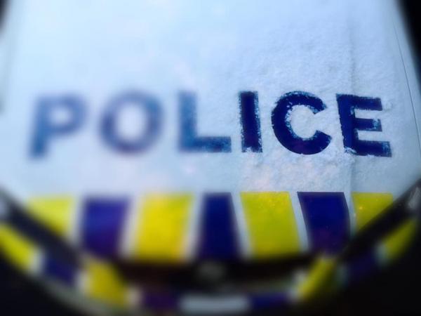 Police car bonnet covered with frost