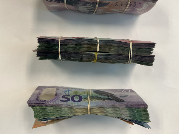 Cash recovered from an envelope labelled 'drugs profit'