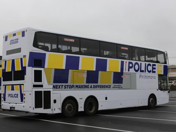 Five Auckland double-decker buses are wrapped in Police livery