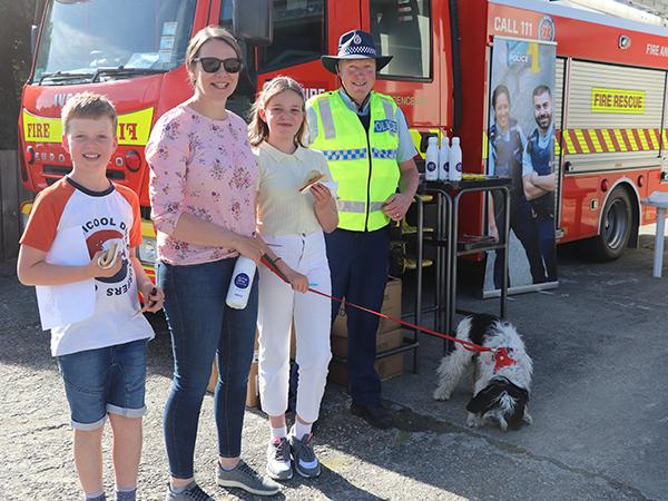 Lawrence Constable Paul Alden with some happy motorists taking advantage of the fatigue stop barbecue