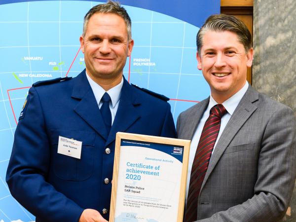 Senior Constable Jude Yeoman with the Hon Michael Wood.