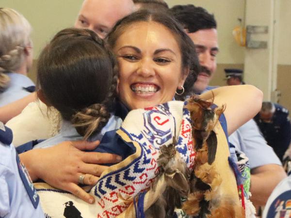 Constable Ceihla Sullivan gives a happy hug to Constable Lauren Recny.