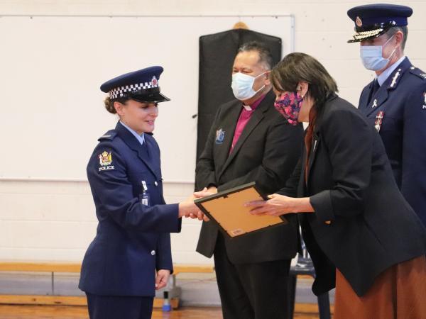 Constable Lauren Recny received a certificate recognising her success as first in wing.