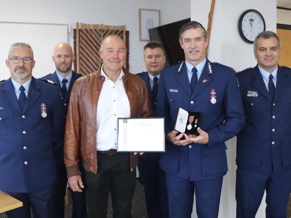 Mark with Commissioner Coster and Wellington District leaders.