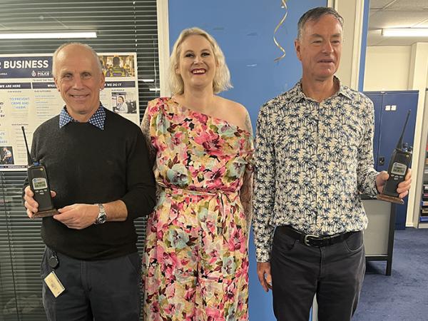 Natalie Grace, District Engagement and Support Manager for the Lower North Island, gifted Ron and Tony decommissioned souvenir r