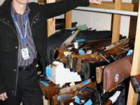 Richard Plas with just some of the guns recovered in the Waikato