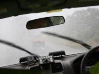 The view of how heavy the rains were from the interior of a patroling Police vehicle