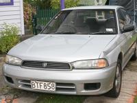1999 silver Subaru Legacy sedan, registration BTF858