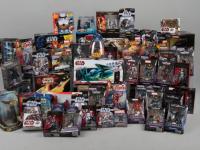 A large collection of Star Wars toys and figurines