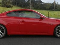 Red Nissan Skyline vehicle