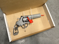 A loaded firearm was located in the footwell of the vehicle