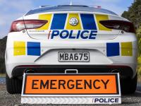 Emergency sign plus police car